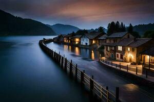 une longue exposition photographier de une rivière et Maisons à nuit. généré par ai photo