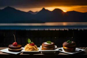 Trois desserts sur une table avec une le coucher du soleil dans le Contexte. généré par ai photo