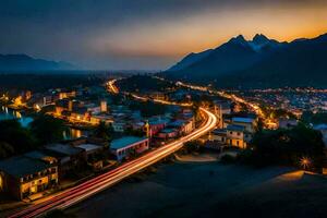 une ville à nuit avec lumières sur le route. généré par ai photo