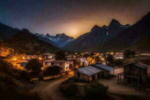 une village dans le montagnes à nuit. généré par ai photo