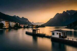 une Lac avec Maisons et montagnes à le coucher du soleil. généré par ai photo