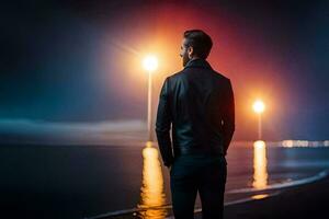 une homme permanent sur le plage à nuit avec une rue lumière. généré par ai photo