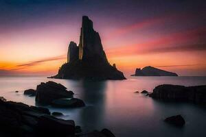 le le coucher du soleil plus de le mer avec rochers dans le premier plan. généré par ai photo