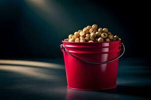 une rouge seau rempli avec cacahuètes sur une foncé tableau. généré par ai photo