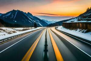 une Autoroute avec neige sur le sol et montagnes dans le Contexte. généré par ai photo