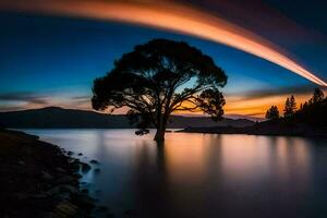 une arbre dans le milieu de une Lac à le coucher du soleil. généré par ai photo