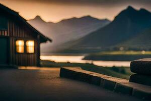 une petit cabine dans le montagnes avec une Montagne dans le Contexte. généré par ai photo