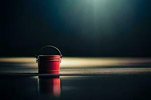 une rouge seau séance sur une noir surface. généré par ai photo