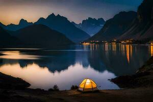 une tente dans le montagnes à nuit. généré par ai photo