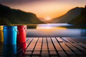 Trois seaux asseoir sur une en bois table avec une Lac dans le Contexte. généré par ai photo