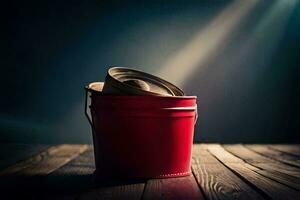 une rouge seau sur une en bois table avec une lumière brillant dans le Contexte. généré par ai photo