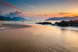 le plage à le coucher du soleil avec vagues et rochers. généré par ai photo
