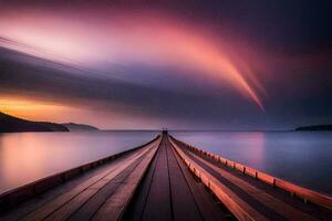 une longue exposition photo de une Dock avec une arc en ciel dans le ciel. généré par ai