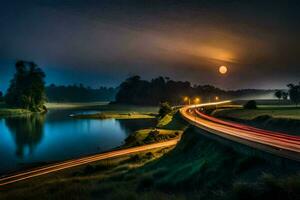 une longue exposition photographier de une route et une rivière à nuit. généré par ai photo
