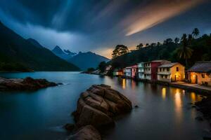 une Lac et Maisons dans le montagnes à nuit. généré par ai photo