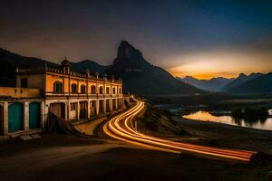 une longue exposition photographier de une bâtiment et montagnes à le coucher du soleil. généré par ai photo