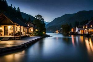une Lac et Maisons dans le montagnes à nuit. généré par ai photo