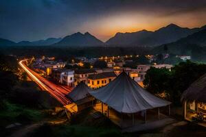 une ville à nuit avec montagnes dans le Contexte. généré par ai photo