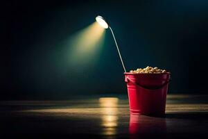 une seau de pop corn sur une table avec une lumière brillant sur il. généré par ai photo