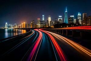 une longue exposition photographier de une ville horizon à nuit. généré par ai photo