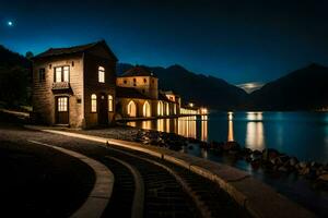 une maison sur le rive de une Lac à nuit. généré par ai photo