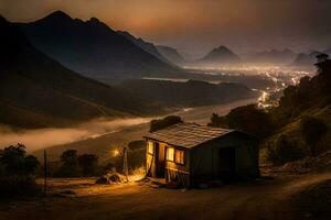 une petit cabane est assis sur le côté de une Montagne à nuit. généré par ai photo