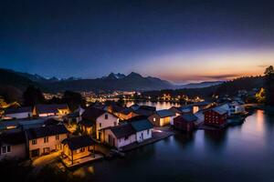 une ville dans le montagnes à nuit avec lumières sur. généré par ai photo