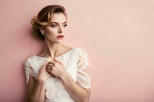 magnifique femme dans blanc robe posant contre rose mur. généré par ai photo