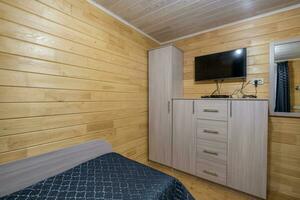 intérieur de en bois éco chambre dans studio appartements, hôtel ou propriété photo