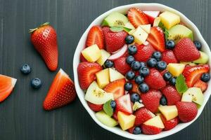 bol de en bonne santé Frais fruit salade. Contexte. ai génératif pro photo