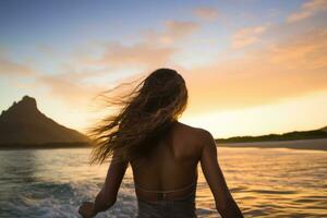 arrière vue de une magnifique Jeune femme avec longue cheveux en volant dans le air et profiter le le coucher du soleil sur le plage, femelle surfeur arrière vue dans mer à coucher de soleil, Oahu, Hawaii, uni États, ai généré photo