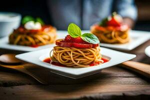 Trois petit assiettes avec spaghetti et tomate sauce. généré par ai photo