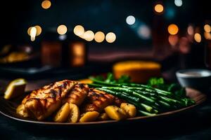 grillé poisson avec asperges et patates sur une plaque. généré par ai photo