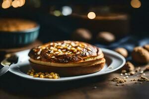 une assiette avec une gâteau sur il et des noisettes. généré par ai photo