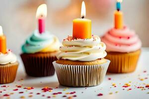 anniversaire bougies sur petits gâteaux. généré par ai photo