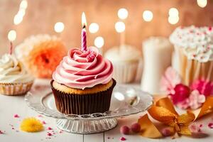 une petit gâteau avec une rose bougie est sur une assiette avec fleurs et bougies. généré par ai photo