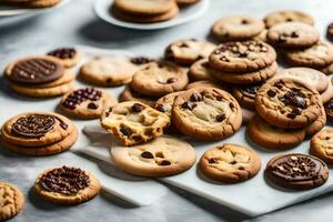 une collection de biscuits sur une marbre comptoir. généré par ai photo