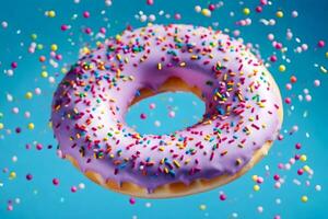 une Donut avec arrose sur Haut de une bleu Contexte. généré par ai photo