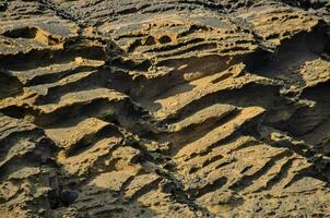 une Roche formation avec beaucoup différent couleurs photo