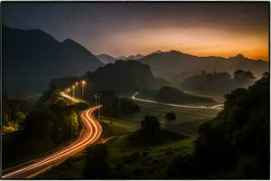 une route dans le montagnes à le coucher du soleil. généré par ai photo