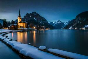 une église dans le neige à nuit. généré par ai photo