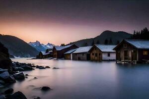 une Lac avec Maisons et montagnes dans le Contexte. généré par ai photo