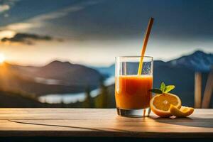 une verre de Orange jus avec une paille sur une en bois table dans de face de une Montagne voir. généré par ai photo