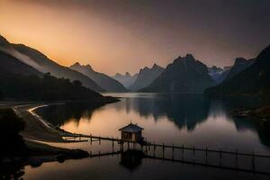 une Lac et montagnes à le coucher du soleil. généré par ai photo