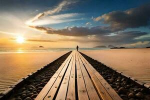 une homme permanent sur une en bois promenade sur le plage à le coucher du soleil. généré par ai photo