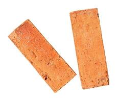 Haut vue de fissuré vieux rouge ou Orange briques isolé sur blanc Contexte avec coupure chemin photo