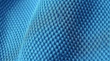 bleu football en tissu texture avec air engrener. tenue de sport Contexte photo