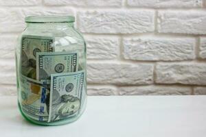 verre pot avec dollar Billet de banque,financier conceptuel image photo