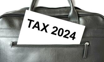 impôt 2024 papier feuille et noir sac photo