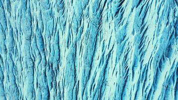 drone coup de énorme glacier rochers sur vatnajokull la glace Masse dans Islande, massif glacé blocs et des fissures formant magnifique islandais paysage. scandinave lagune, nordique repère. lent mouvement. photo